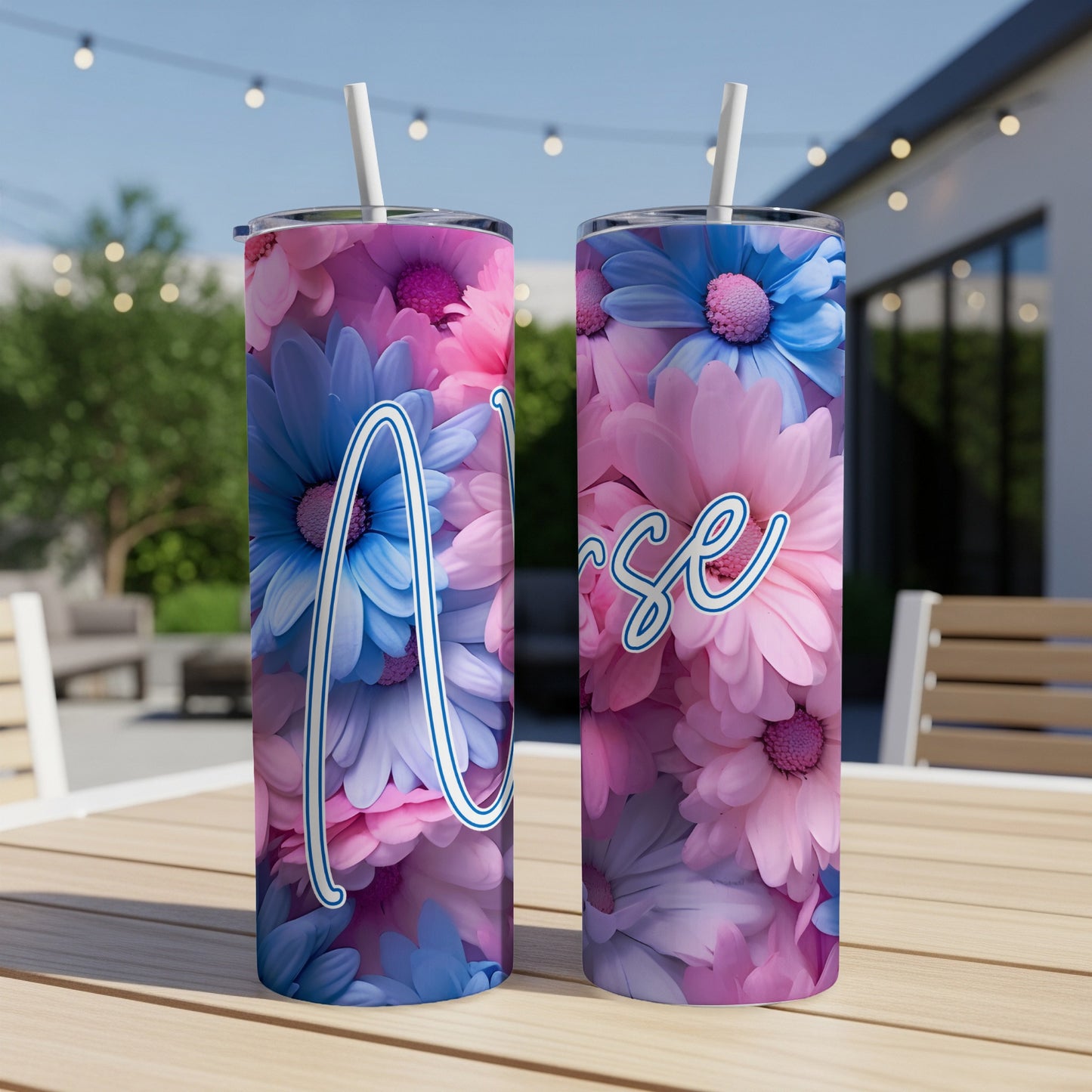 Two tumblers with "Nurse" in floral lettering on a wooden table.