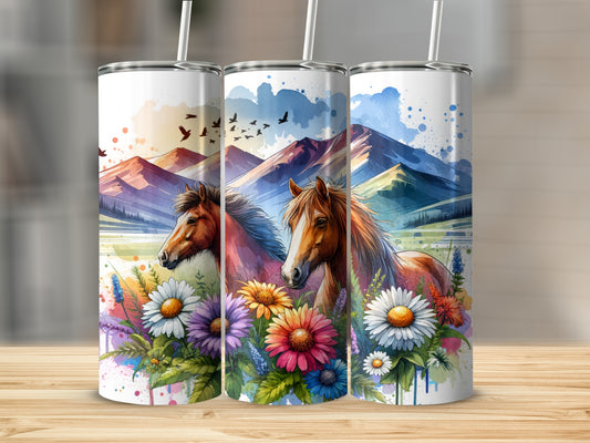 Three tumblers featuring horses, mountains, and colorful wildflowers.
