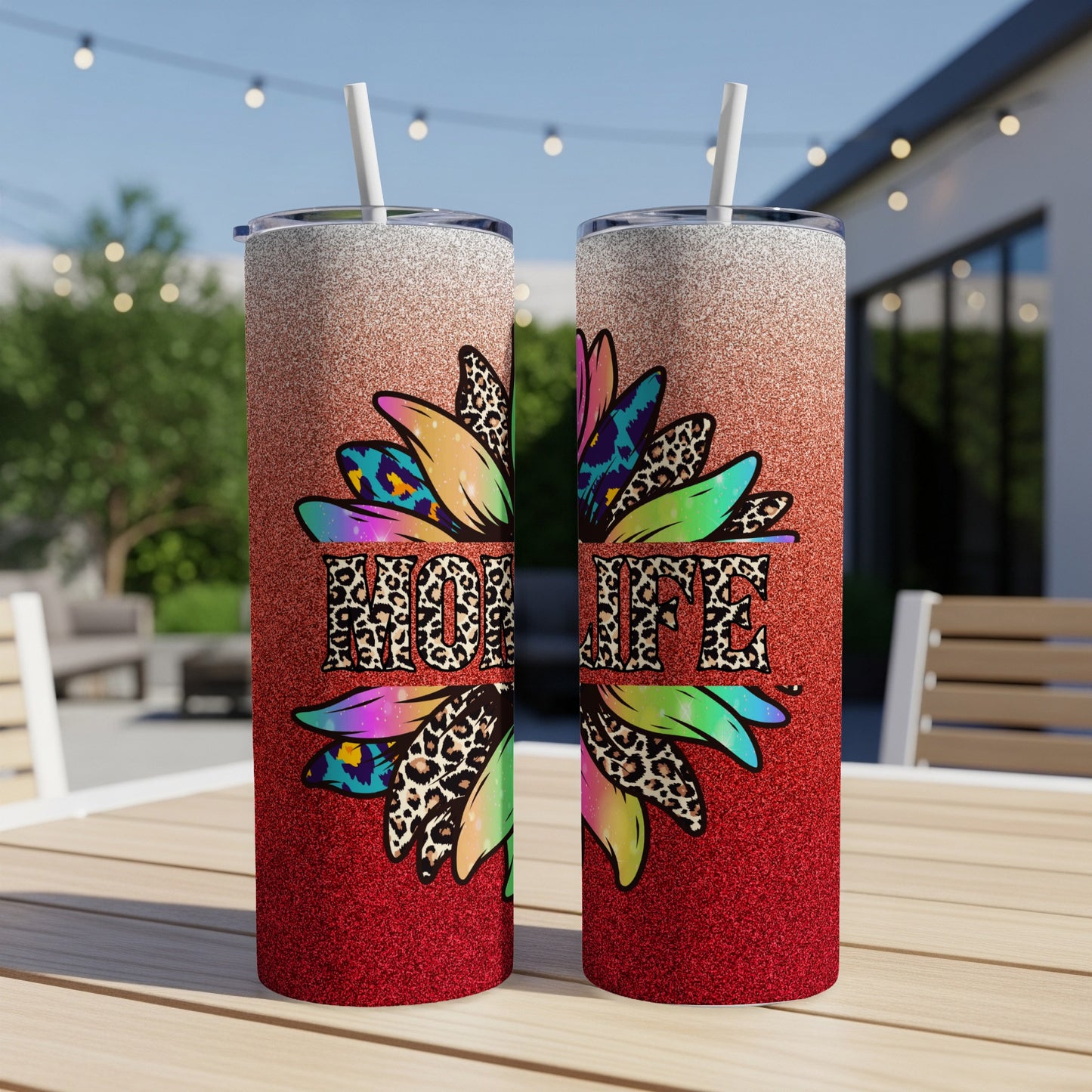 Two tumblers with "Mom Life" text and a colorful sunflower design.