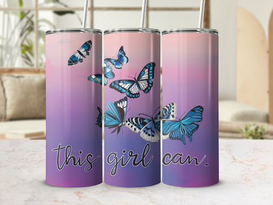 Tumbler with butterflies and text "this girl can" on a gradient background.