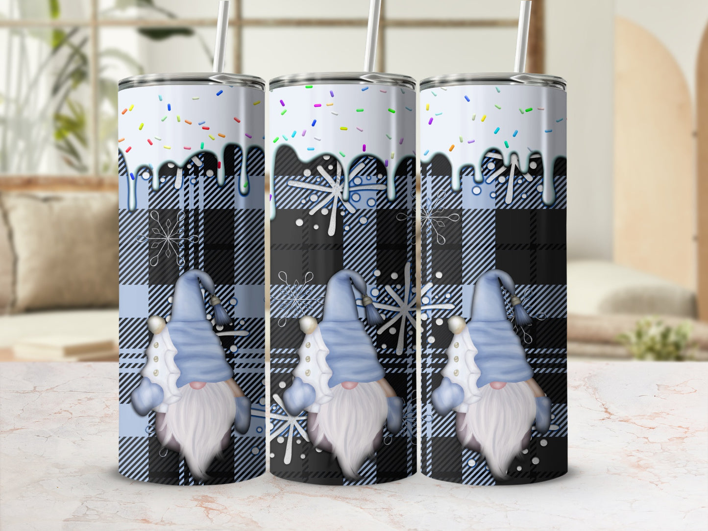 Three tumblers with gnome design on buffalo plaid background.