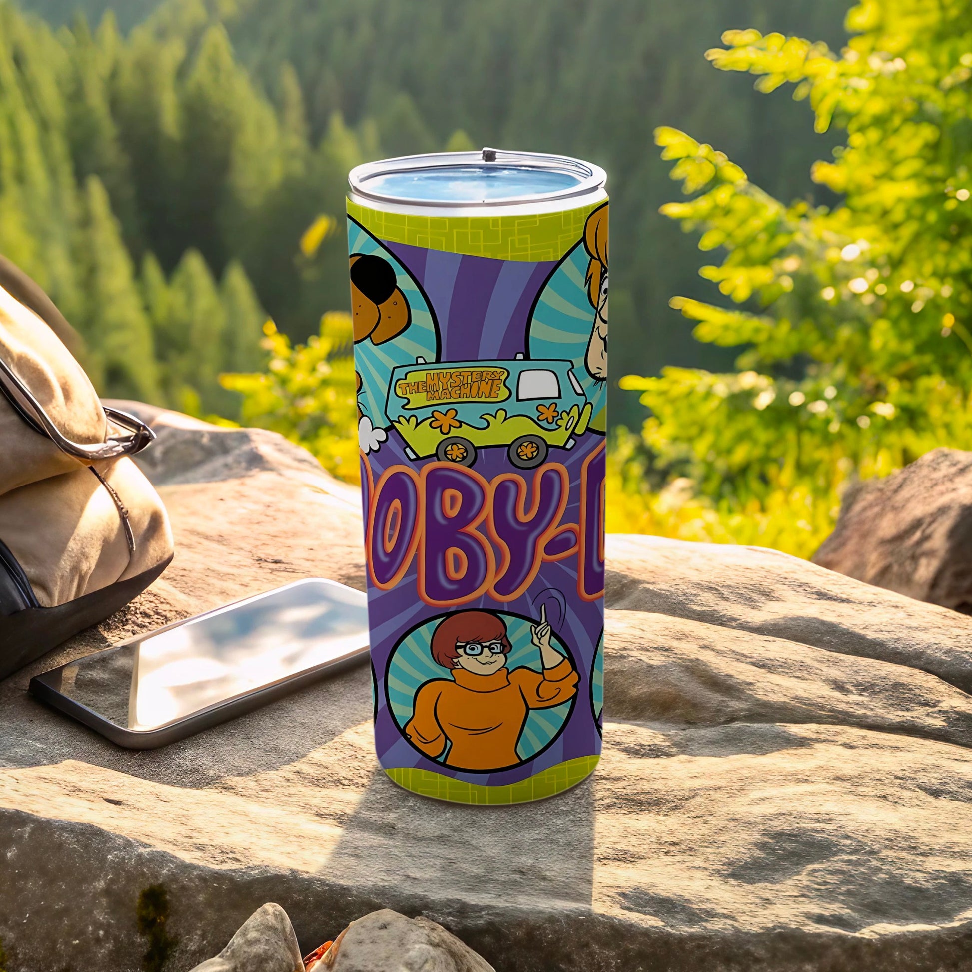 Scooby-Doo Mystery Machine tumbler with characters and purple background.