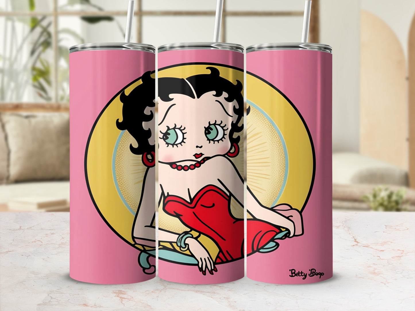 Betty Boop in red dress on pink tumbler with straw.