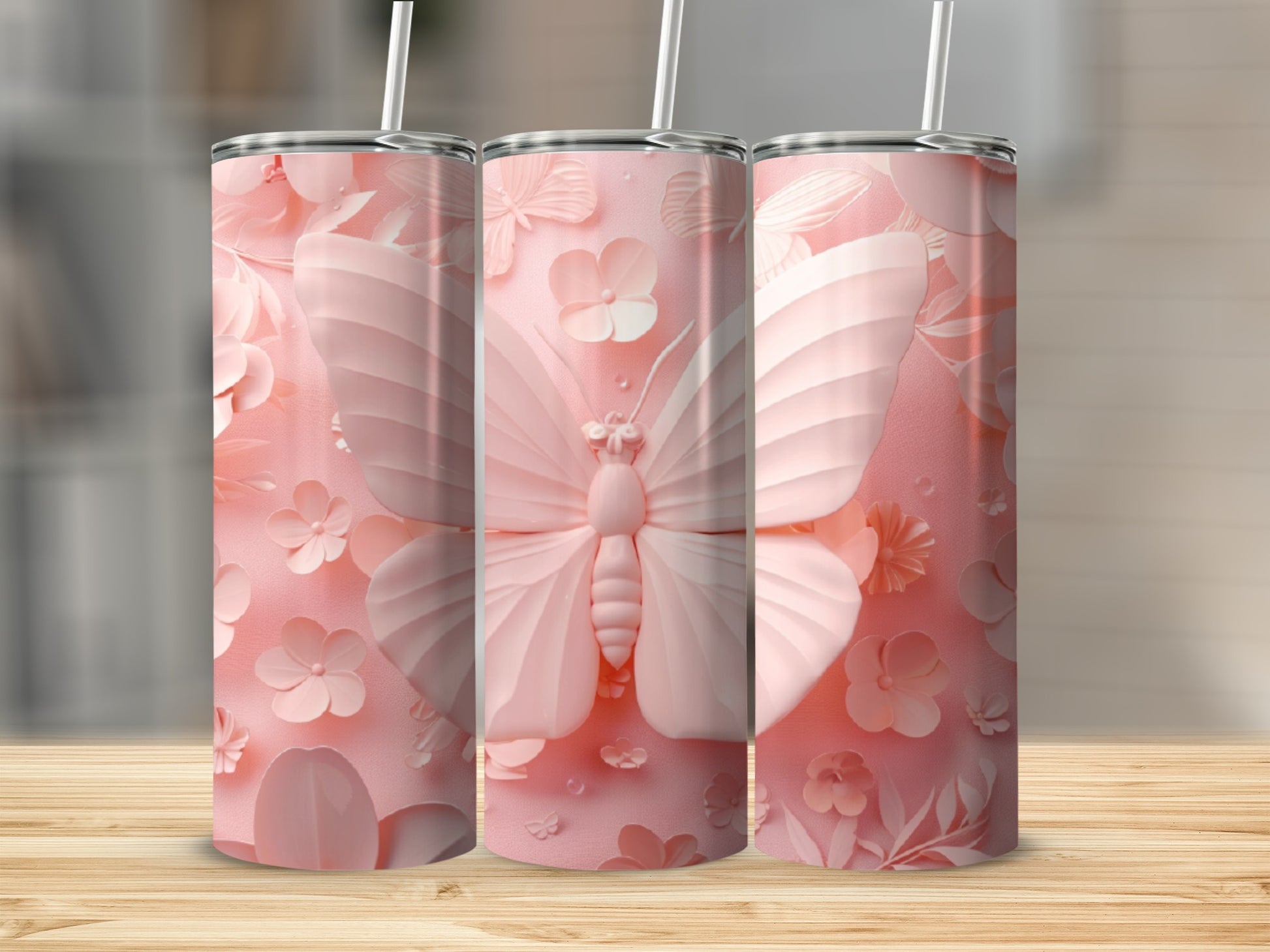 Pink butterfly and floral pattern on a tall, slender tumbler.