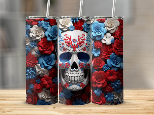 Skull tumbler with red, white, and blue flowers.