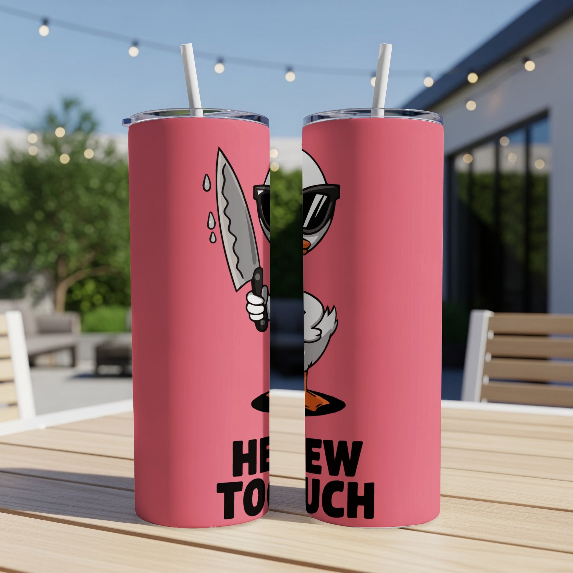 Pink tumbler with cartoon duck holding knife and "He'll touch" text.