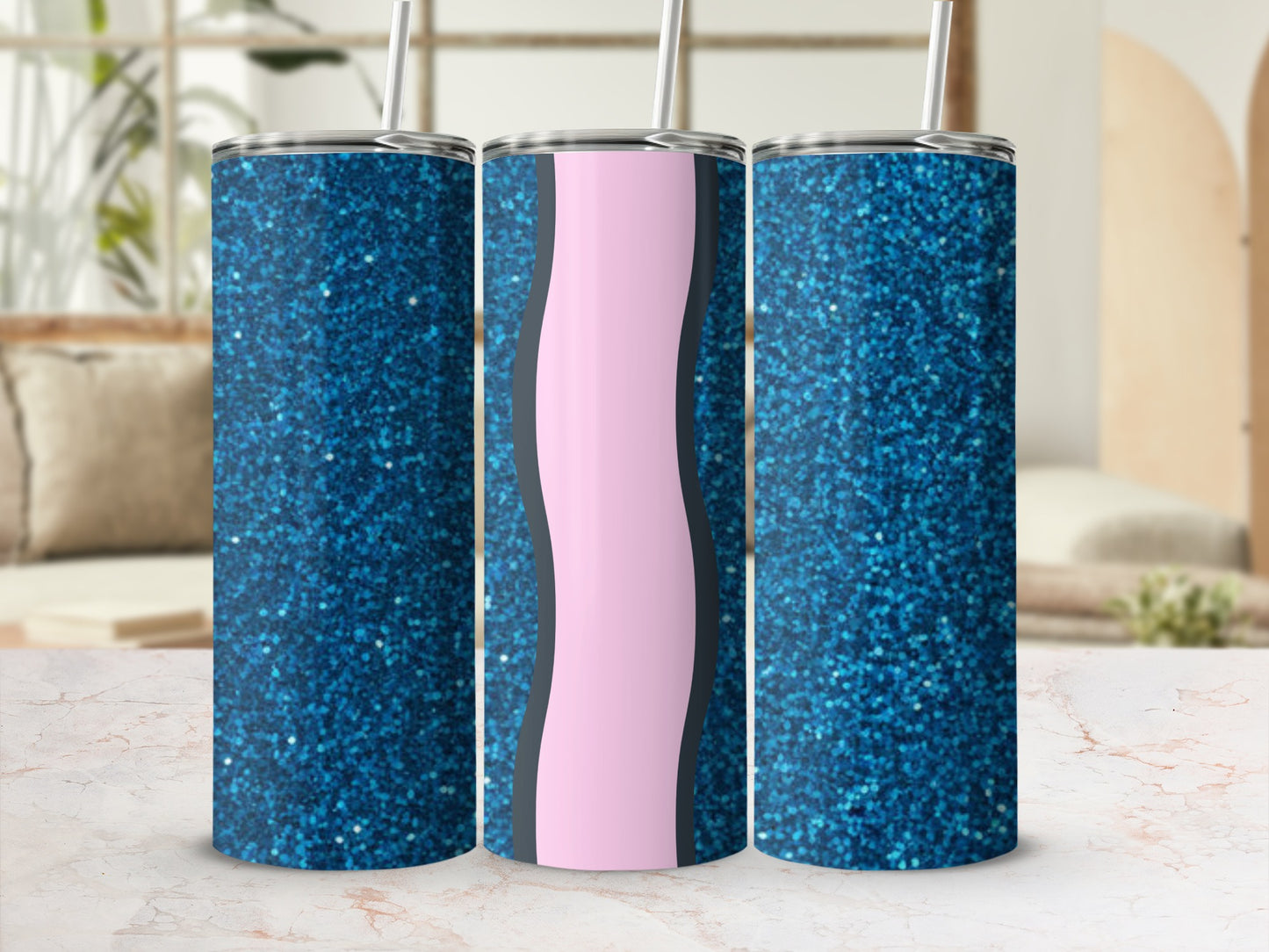 Three glittery blue tumblers with pink and black wavy stripe accents.
