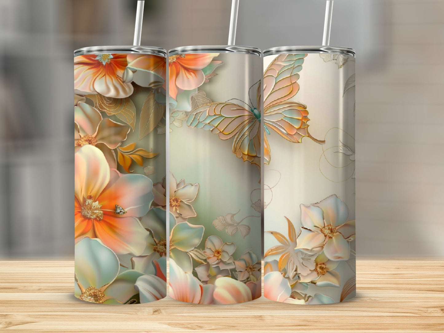 Three tumblers with floral and butterfly designs in pastel colors.