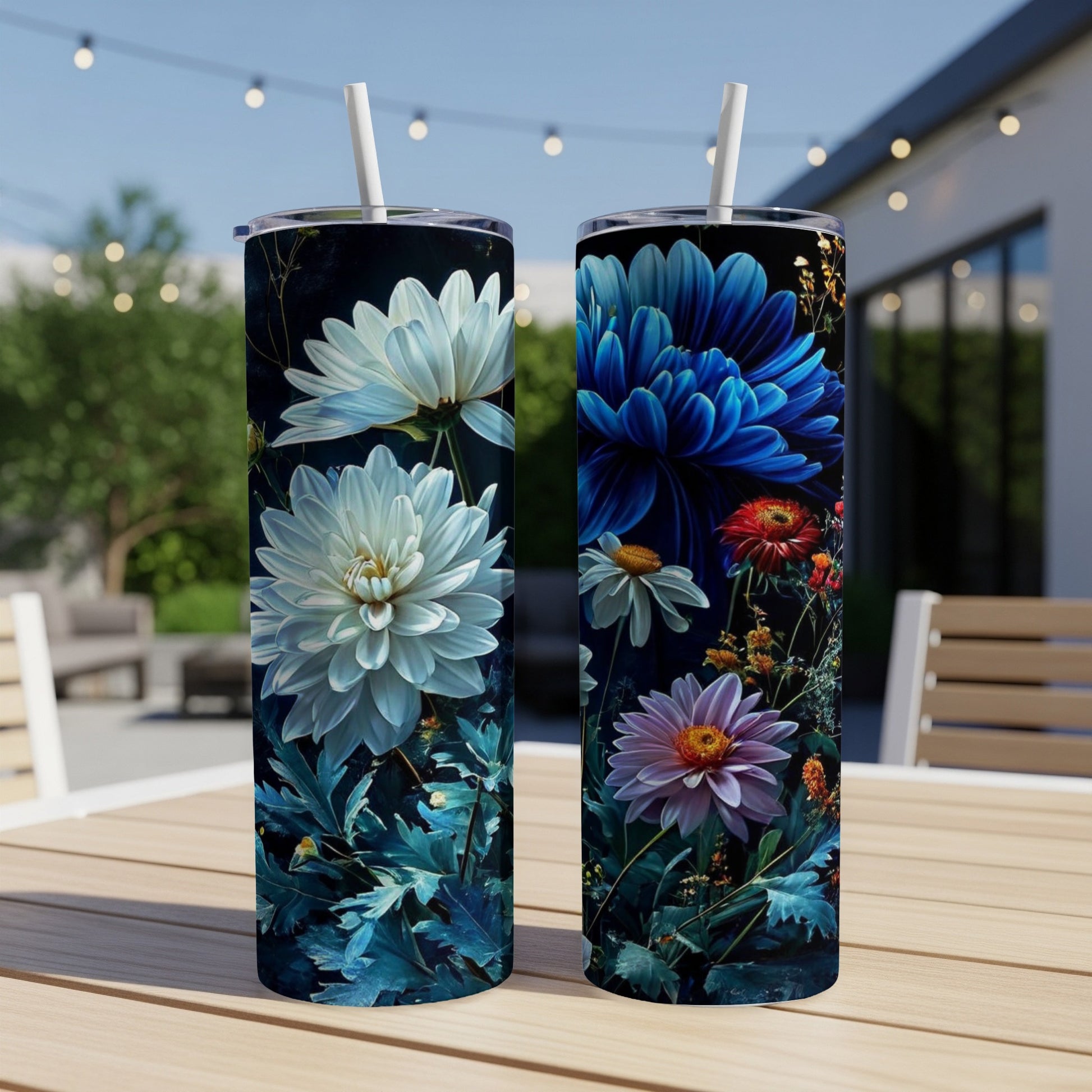 Two tall tumblers featuring dark floral patterns with large white, blue, and pink flowers.
