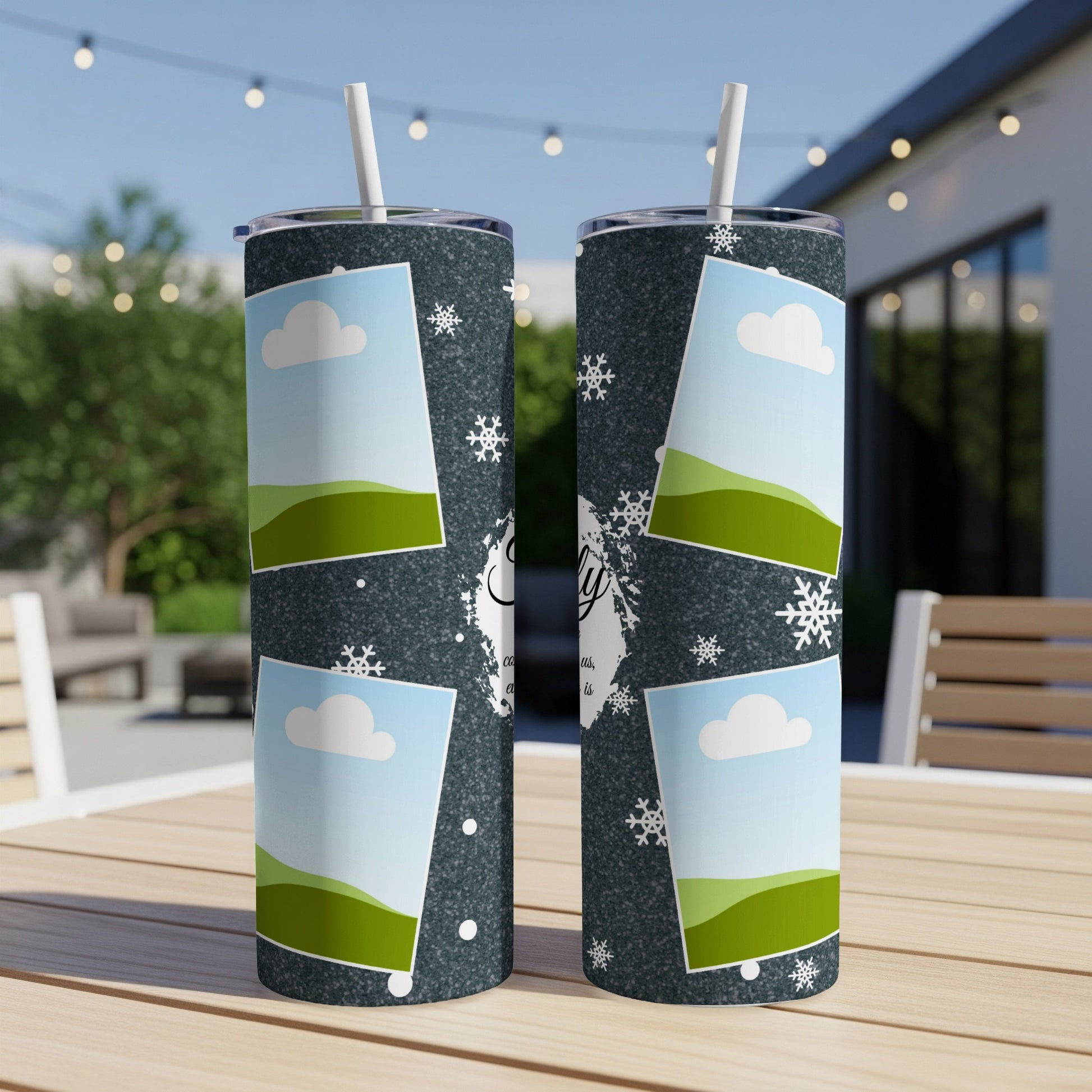 Two tumblers with a dark, speckled pattern and scattered snowflakes.