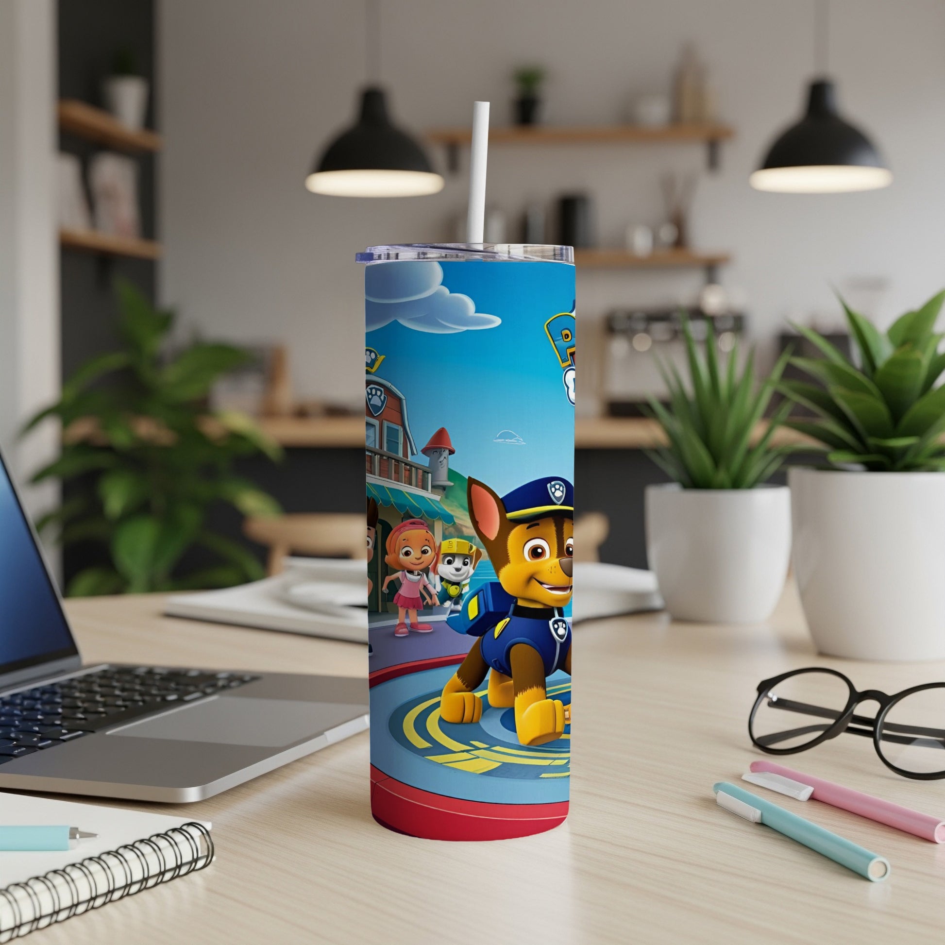 Paw Patrol characters Chase and Skye on a blue and red tumbler with straw.