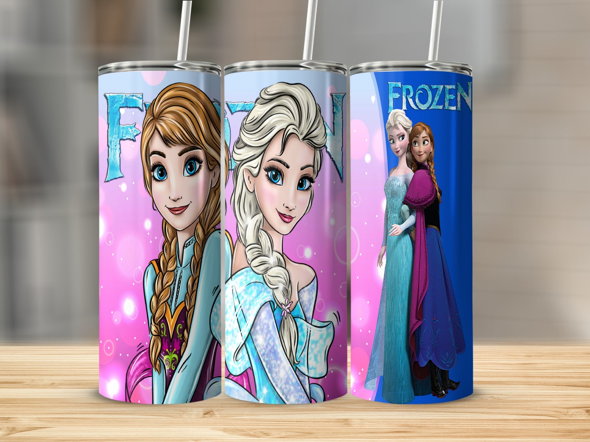 Frozen characters Anna and Elsa on three decorated stainless steel tumblers.