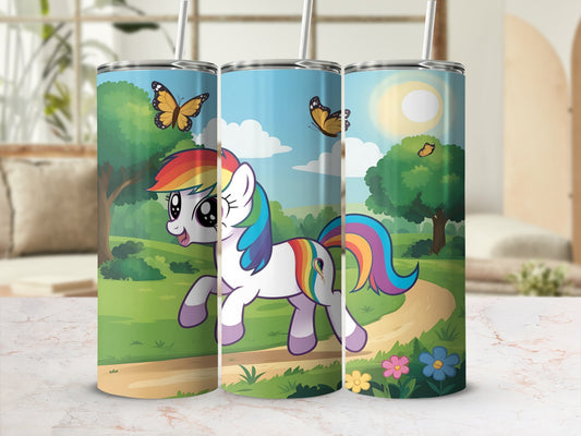 Rainbow unicorn with flowing mane and tail in a whimsical forest setting.