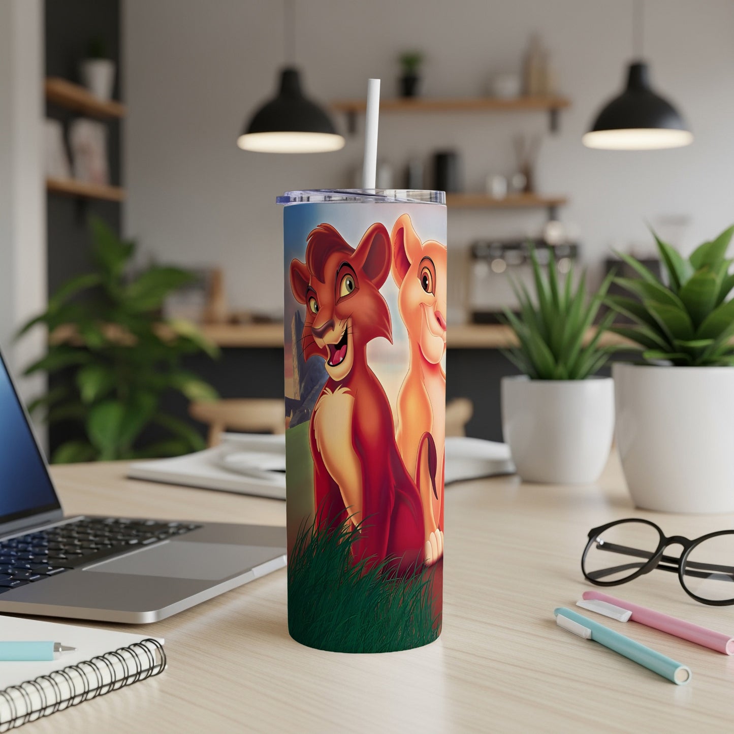 Simba and Nala from The Lion King on a tumbler with a straw.