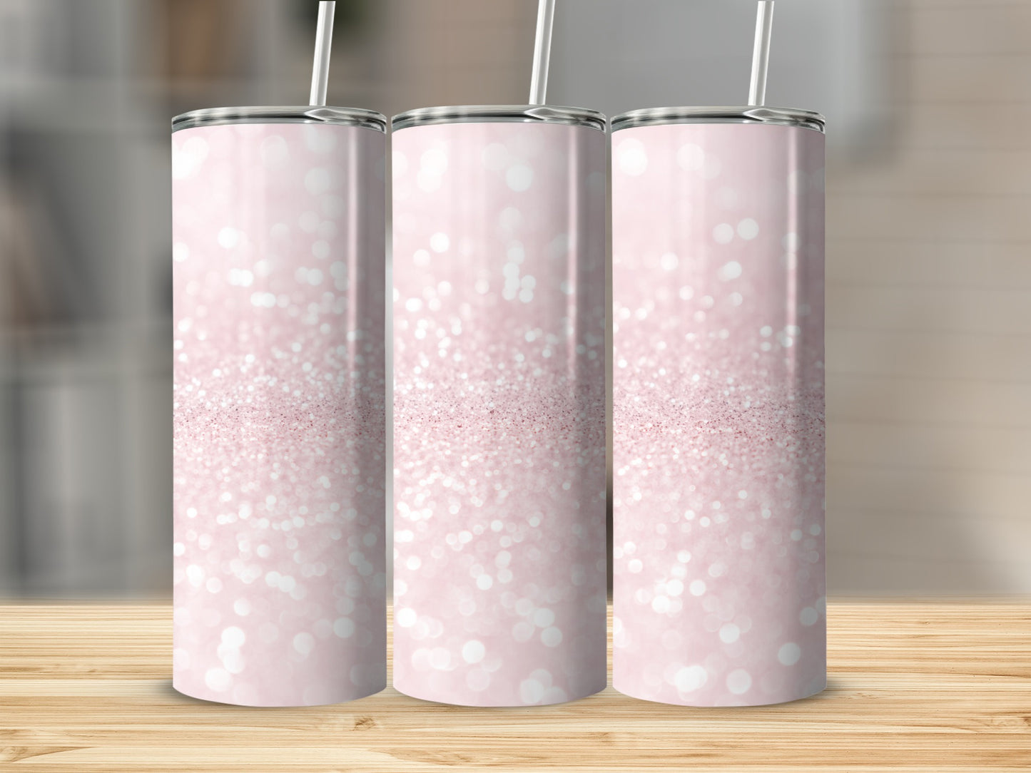 Three tall, slender tumblers with a pale pink glitter bokeh design.