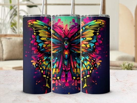 Colorful butterfly tumbler with straw, displayed on a marble countertop.