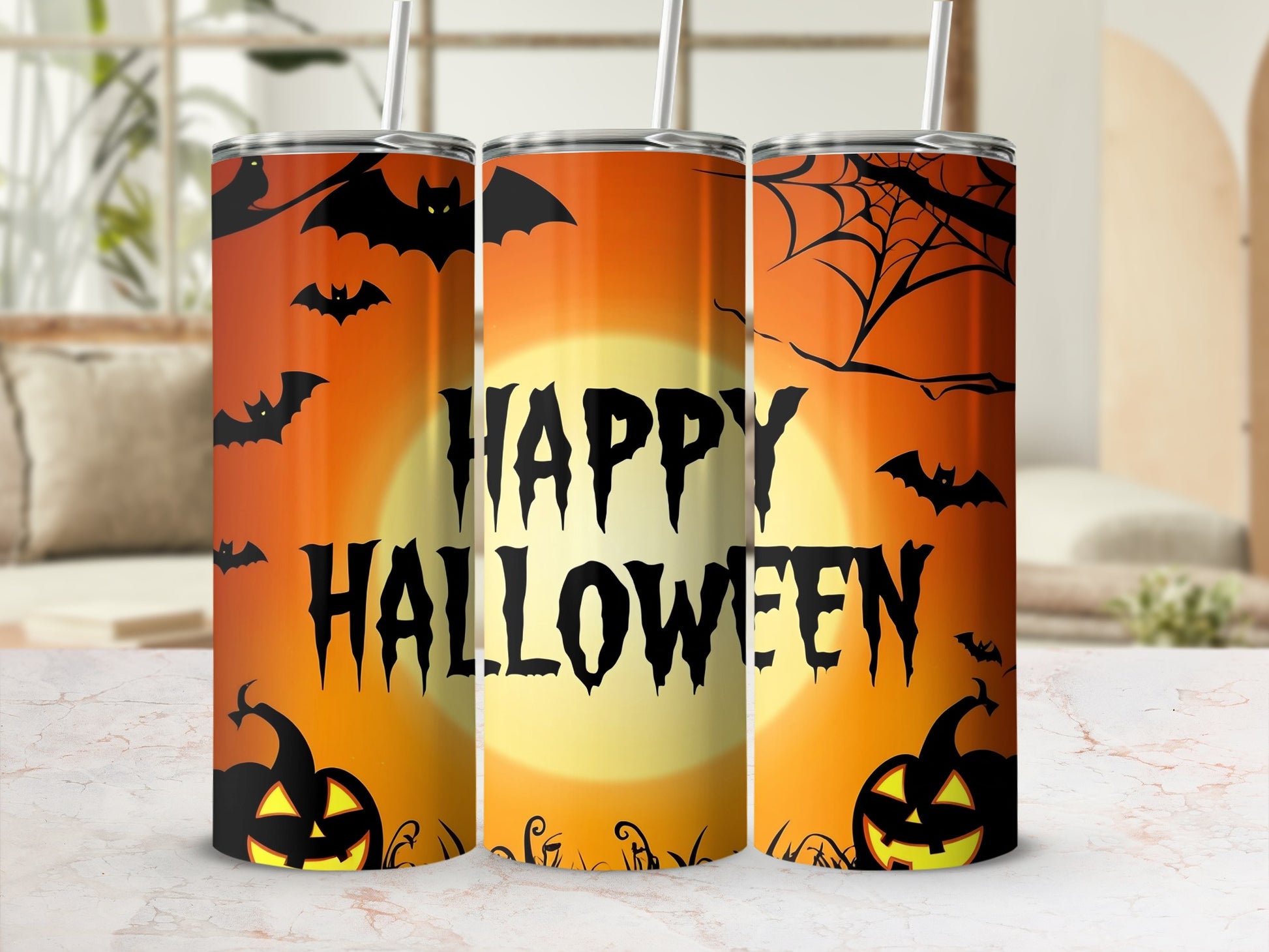 Trio of tumblers with "Happy Halloween" text, bats, pumpkins, and spiderwebs.