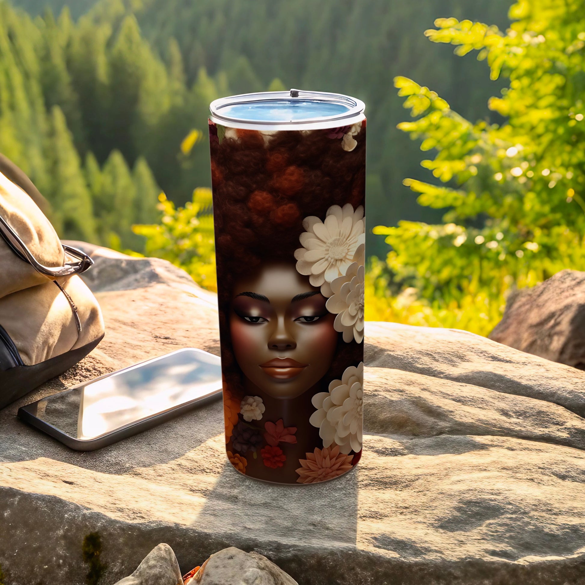 Tumbler featuring a Black woman's face with floral accents against a blurred forest background.