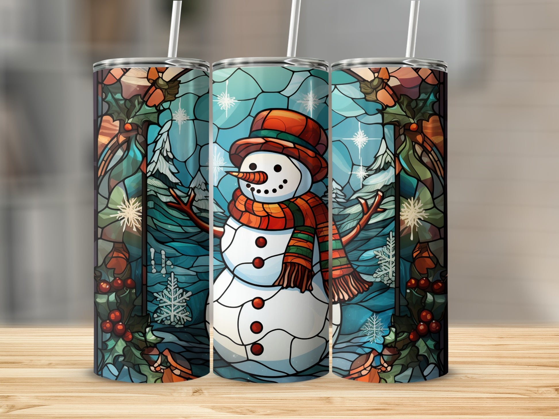 Three stained glass tumblers featuring a snowman in a winter scene.