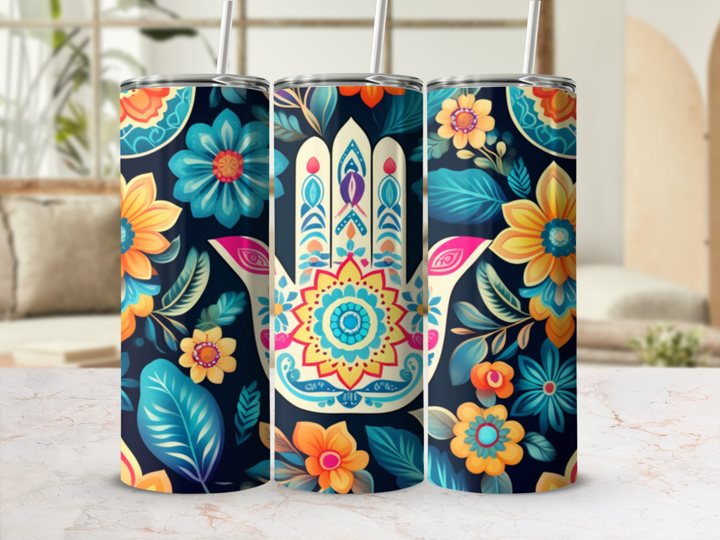 Tumbler with Hamsa hand and floral design in blue, orange, and yellow.
