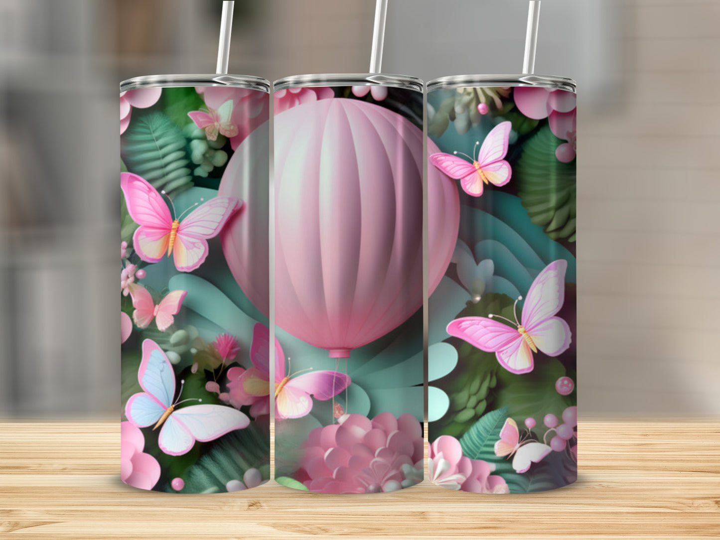 Pink hot air balloon and butterflies on a floral pattern tumbler.