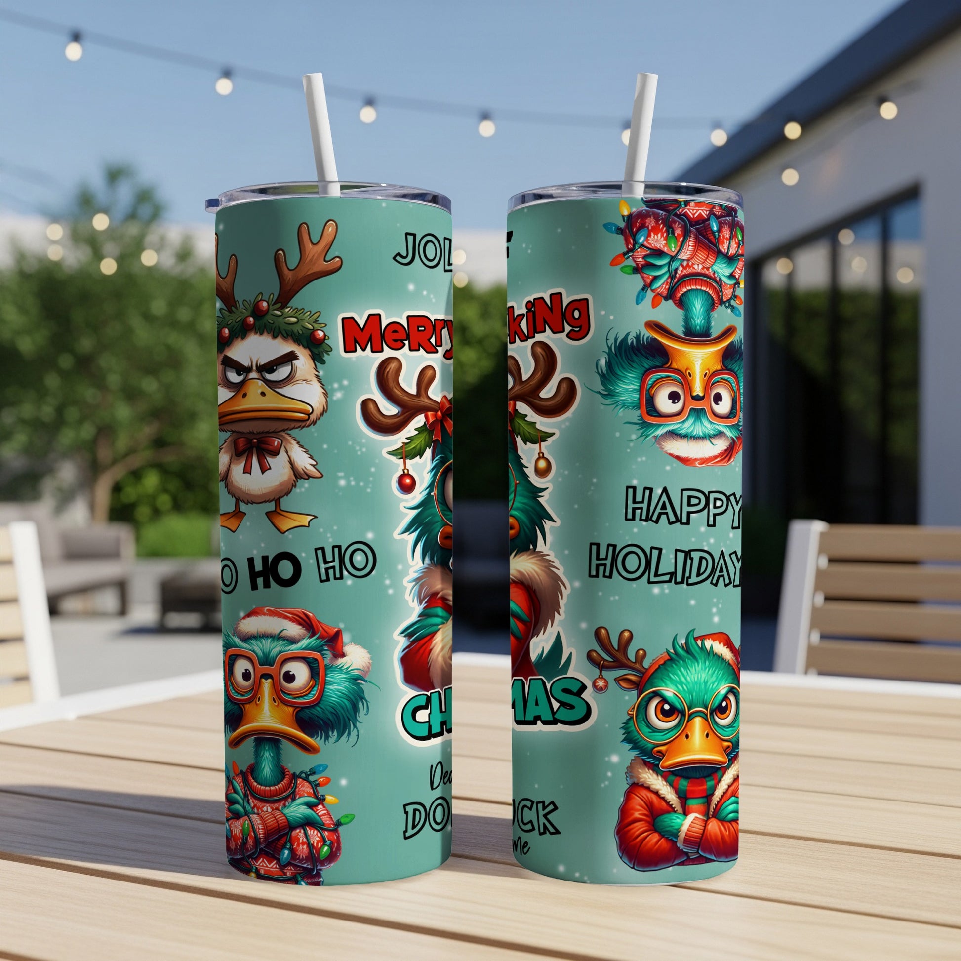 Two tumblers with cartoon Christmas ducks and "Merry Christmas Happy Holidays" text.