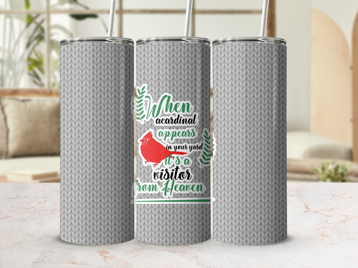 Gray knit pattern tumbler with a cardinal and "When a cardinal appears in your yard it's a visitor from heaven."