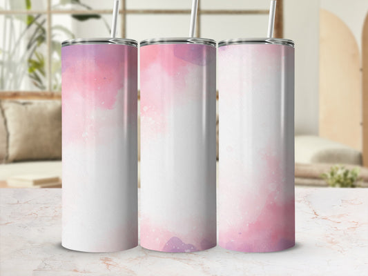 Three tumblers with watercolor pink and purple ombre designs.
