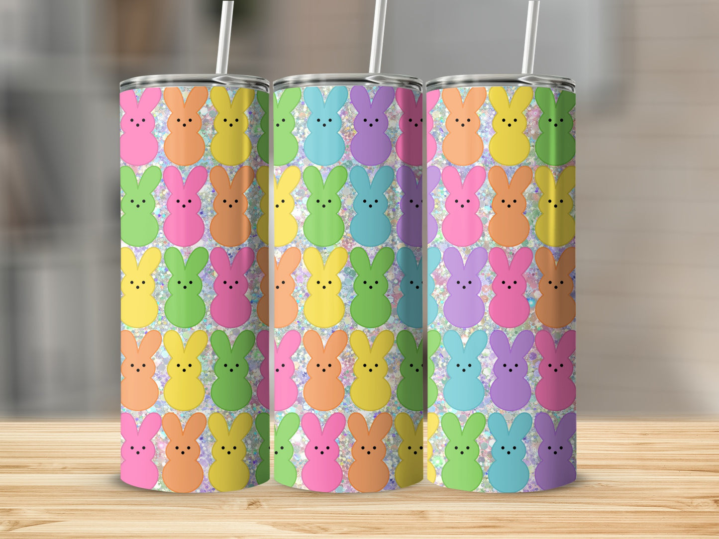 Tumbler with pastel bunny pattern in pink, yellow, green, and blue.