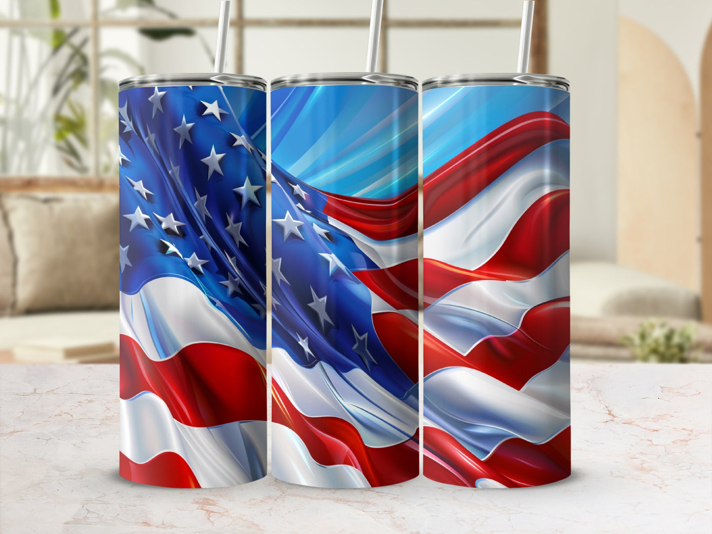 Three tumblers with American flag design on a marble surface.