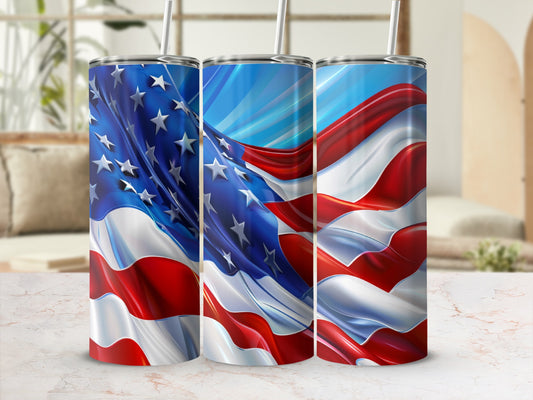 Three tumblers with American flag design on a marble surface.