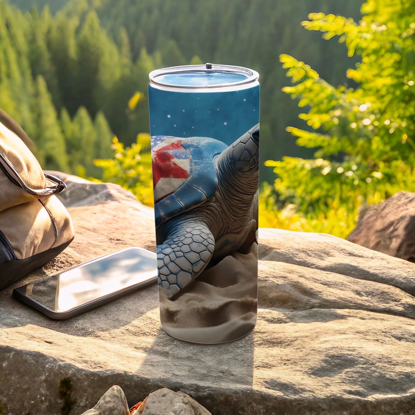 Tumbler with turtle wearing a hat, standing on sand with starry flag background.