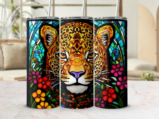 Leopard face in stained glass style with floral accents on a tumbler.