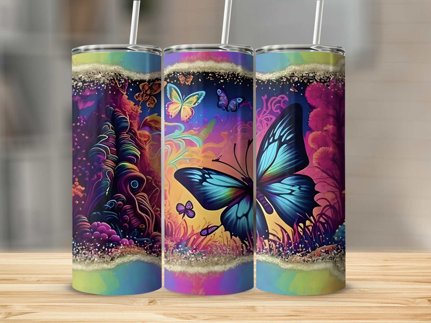 Colorful tumbler with large blue butterfly and abstract floral designs.