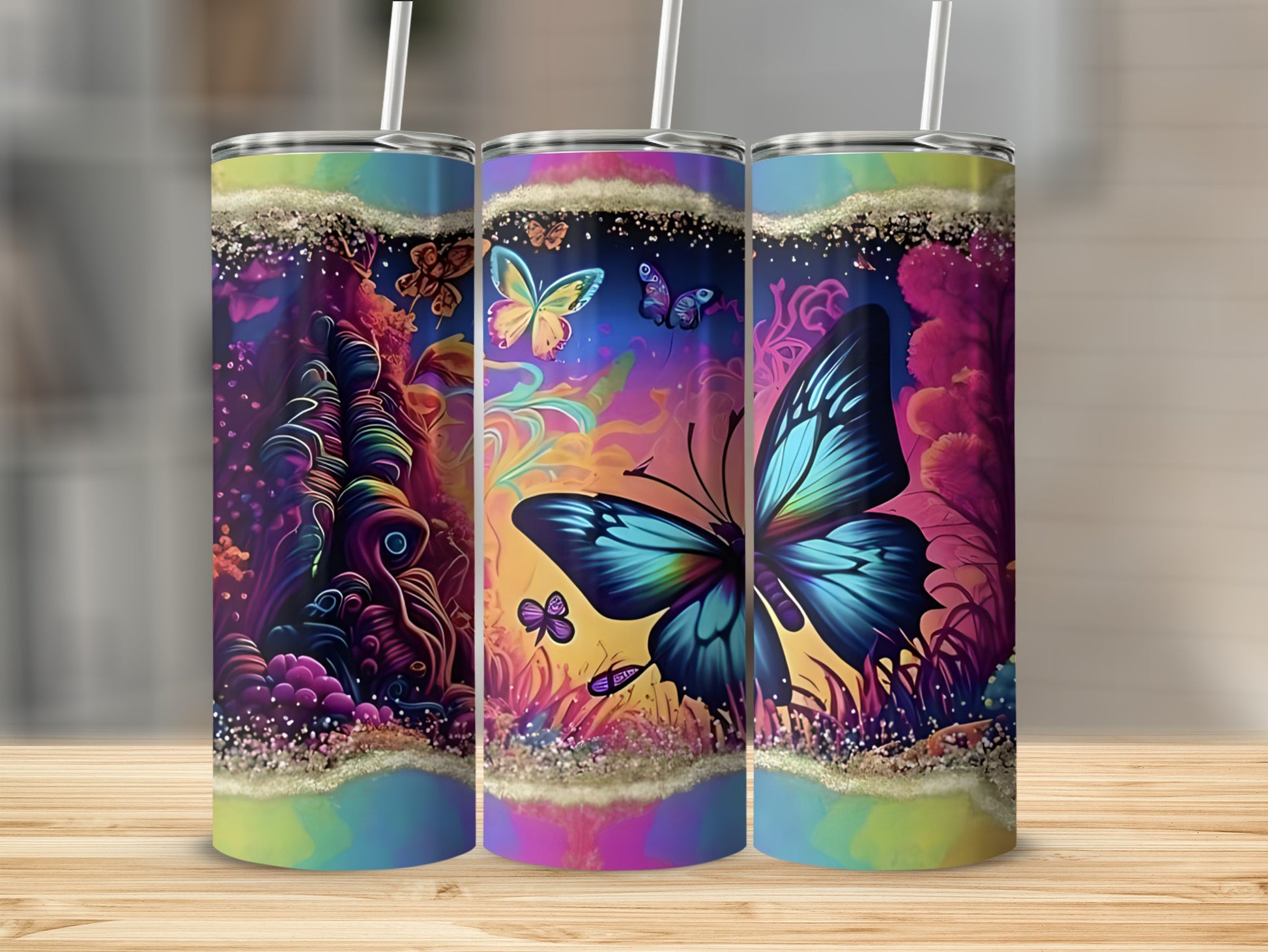 Colorful tumbler with large blue butterfly and abstract floral designs.