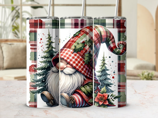 Christmas gnome with plaid hat and red accents, surrounded by pine trees.