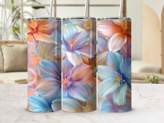 Three tumblers with a watercolor floral pattern in pastel shades.