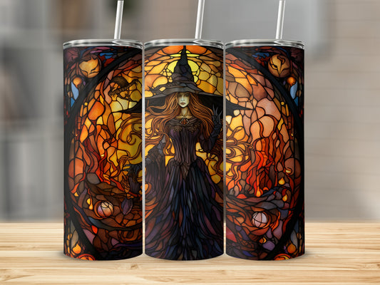 Stained glass witch with outstretched hand against fiery background on a tumbler.