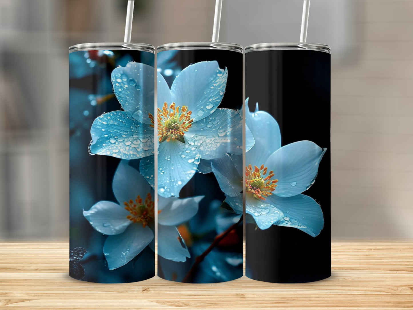 Three tumblers featuring close-up of white flowers with water droplets.