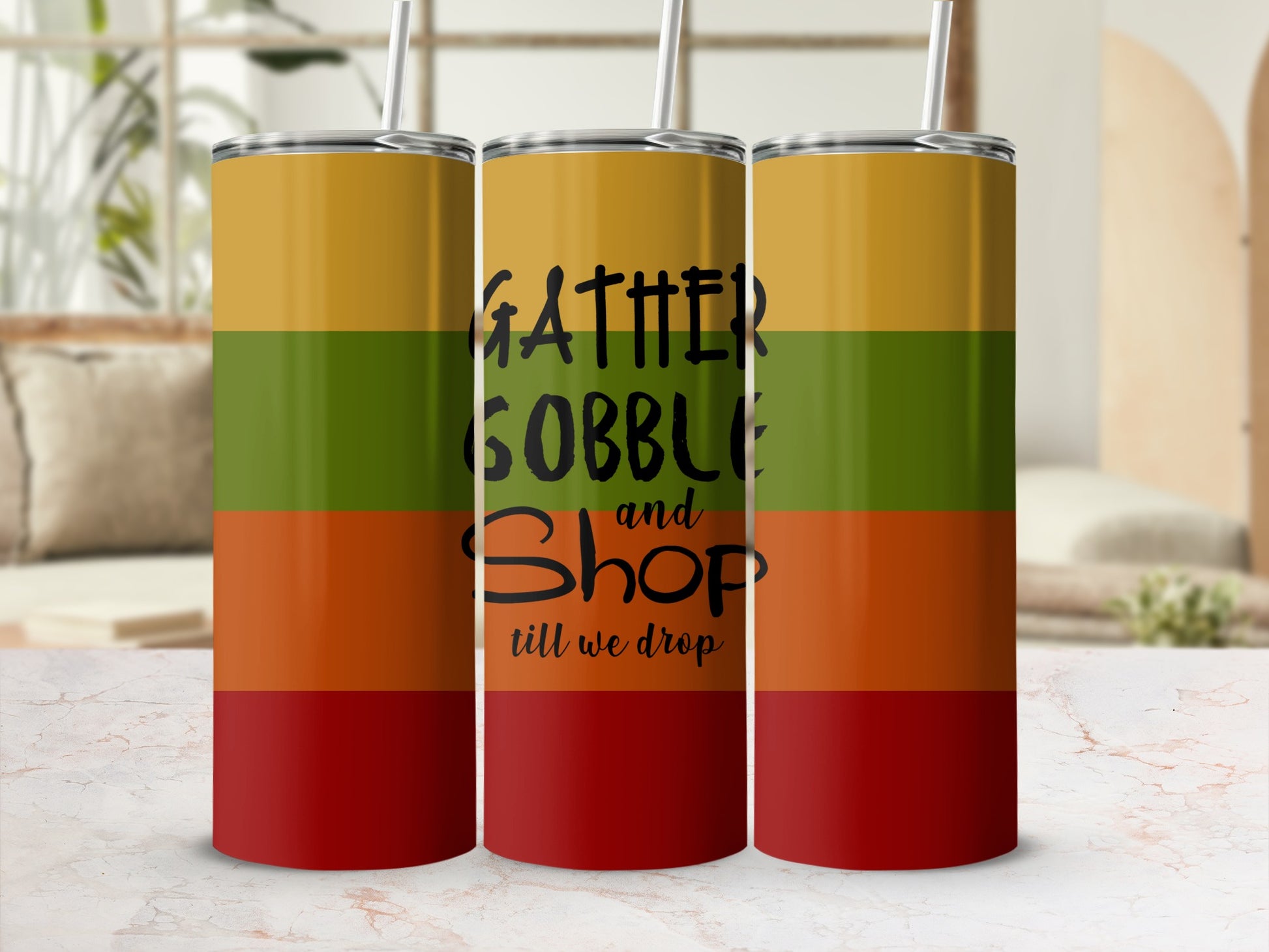 Three tumblers with "Gather Gobble and Shop till we drop" text on stripes.