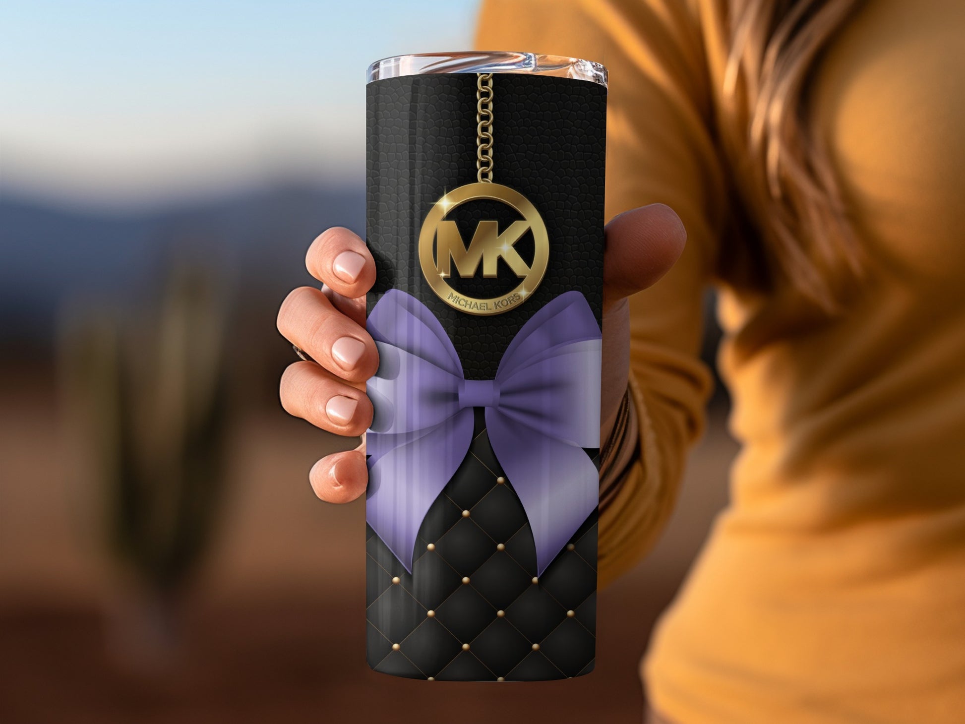 Elegant Tumbler with Gold Charm and Purple Bow Design