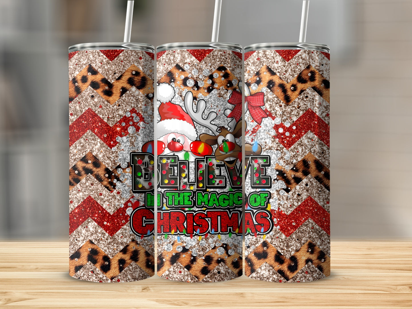 Christmas tumbler with Santa, reindeer, and "Believe in the magic of Christmas" text.