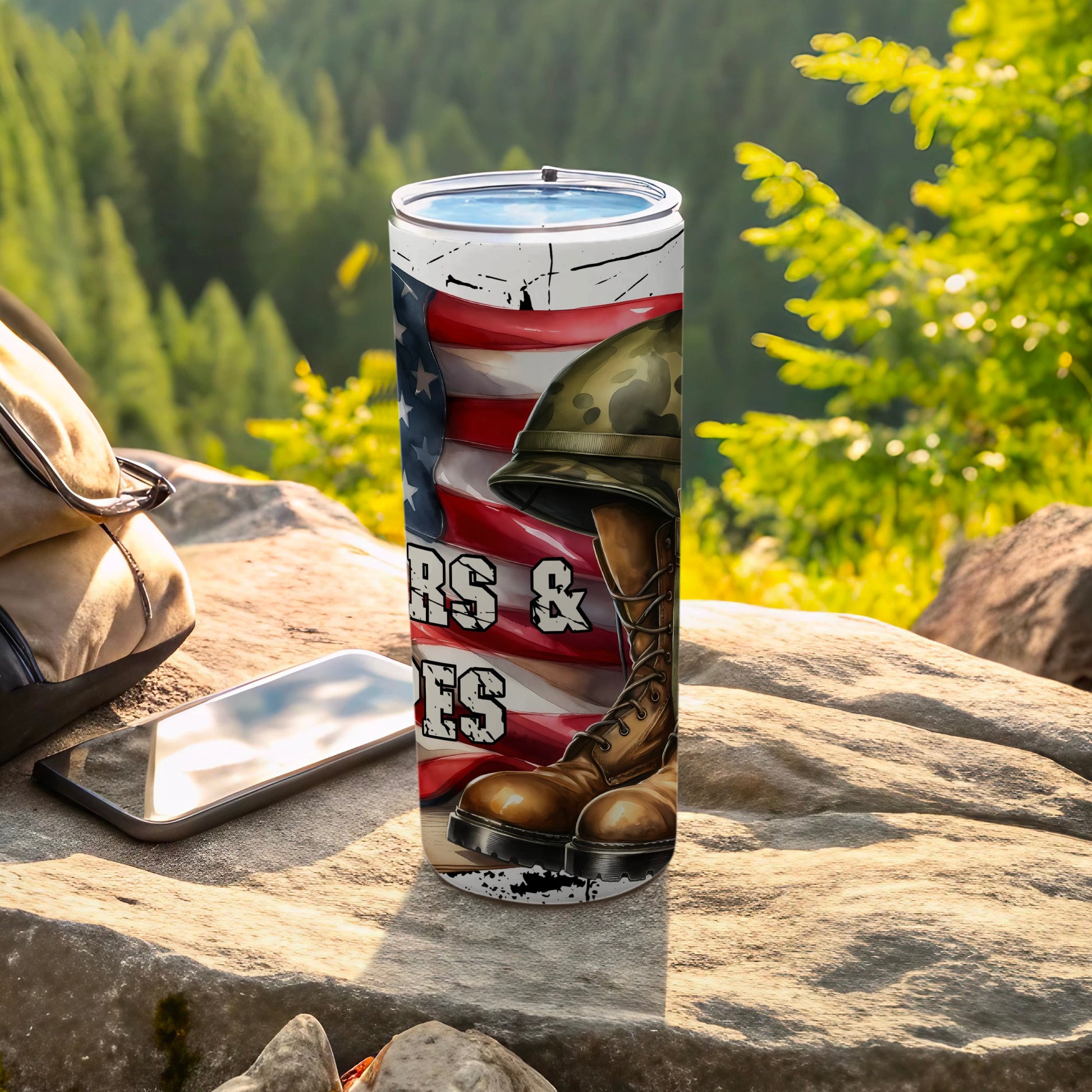 Tumbler with American flag, military helmet, boots, and text "Soldiers and Heroes".