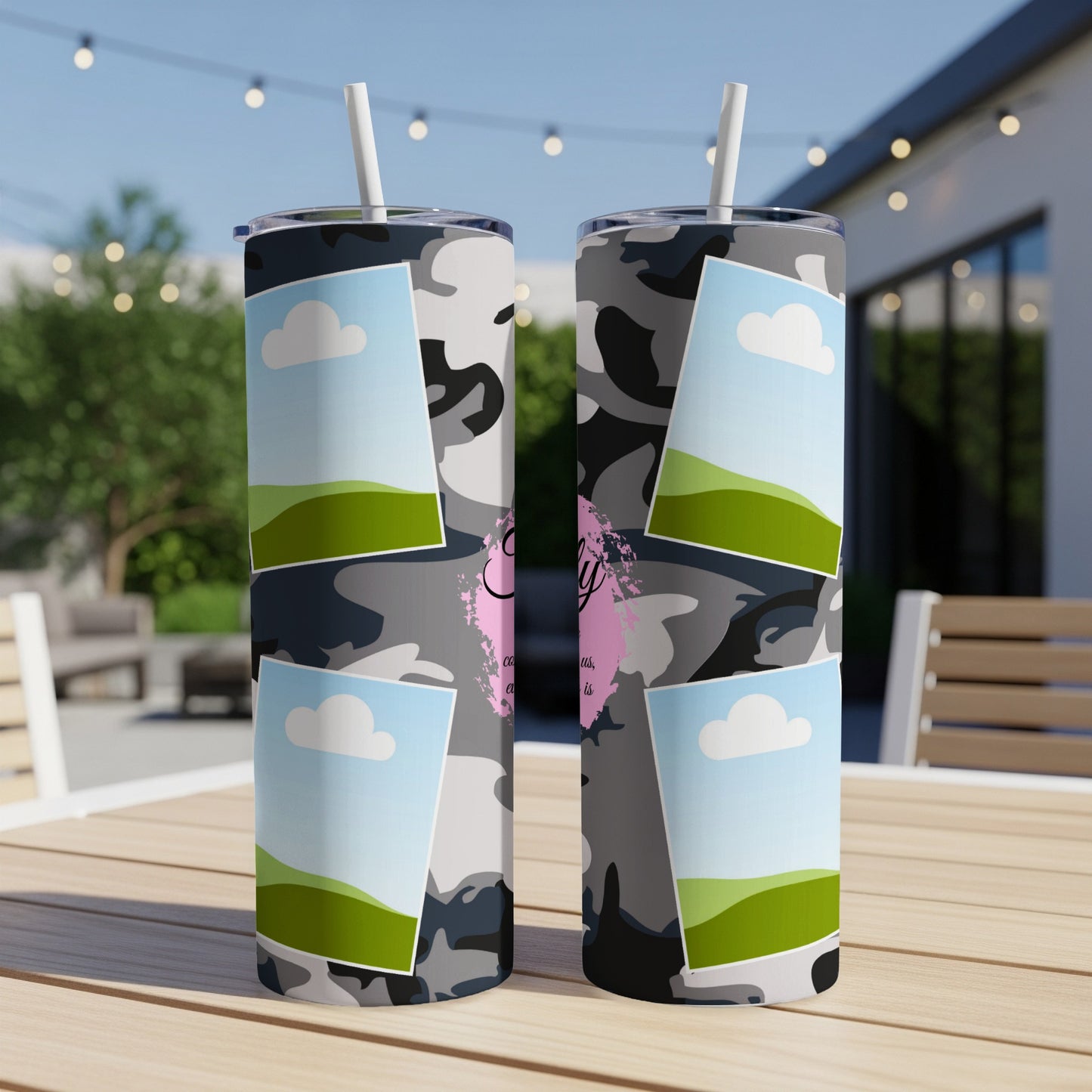 Two tumblers with camouflage pattern and photo frames featuring clouds and green hills.