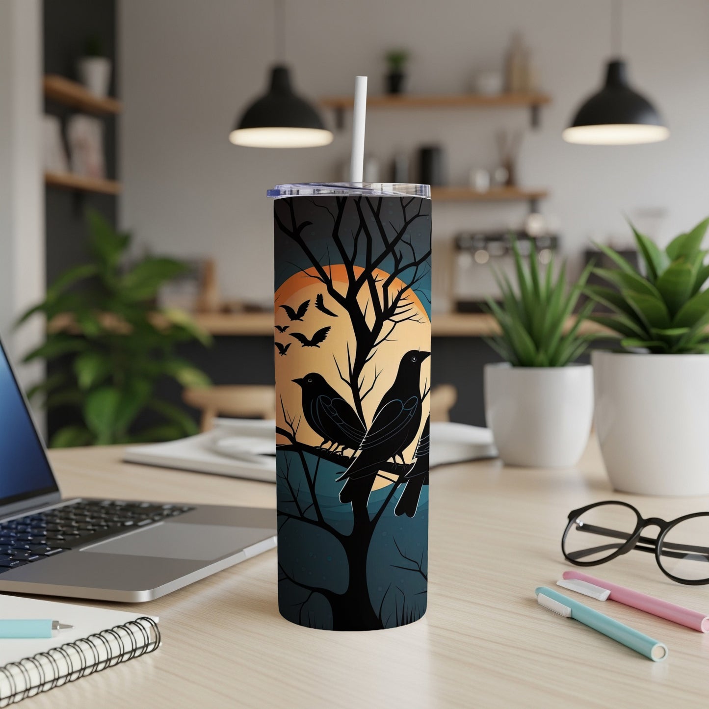 Tall tumbler with crows on a tree branch against an orange moon.