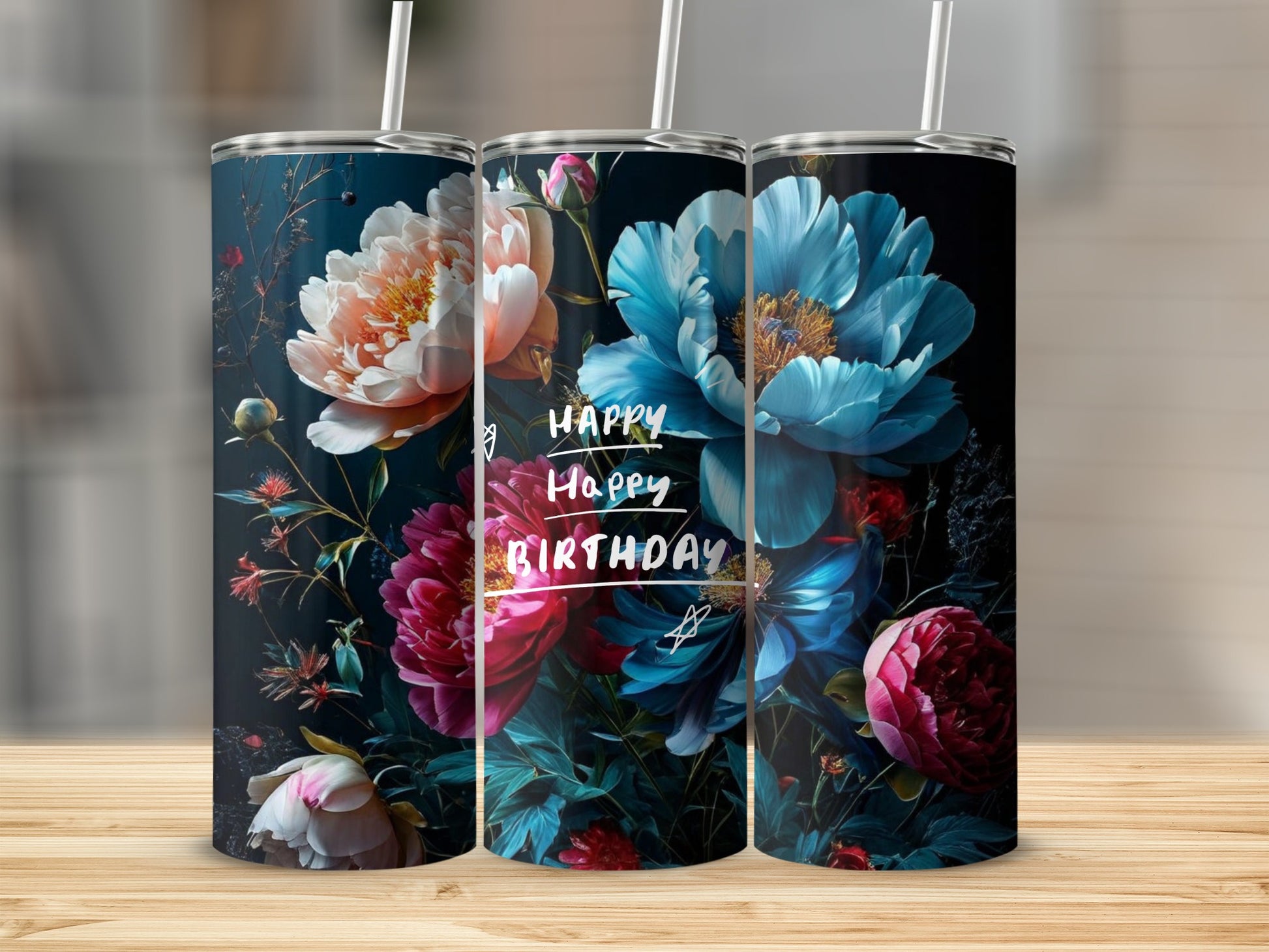 Three tumblers with vibrant floral designs and "Happy Birthday" text.