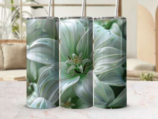 Close-up of a pale green metallic flower design on three tumblers.