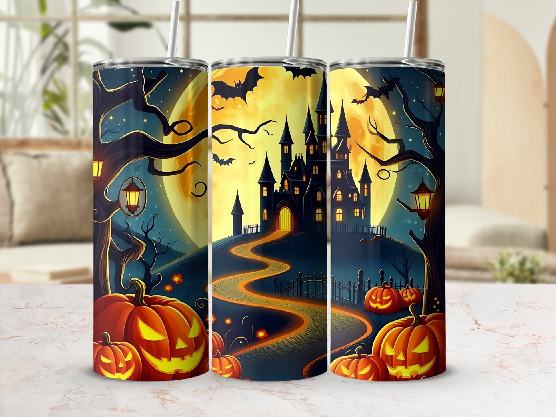 Halloween tumblers featuring pumpkins, a haunted castle, and bats under a full moon.