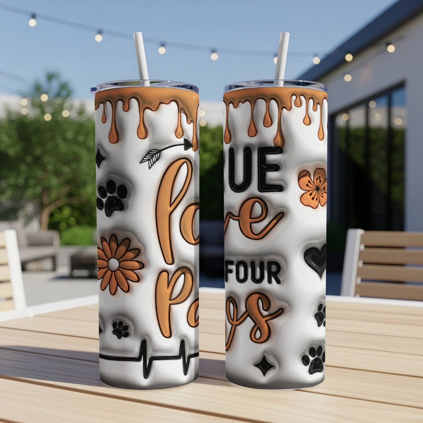 White tumbler with "Love Four Paws" and paw prints design.