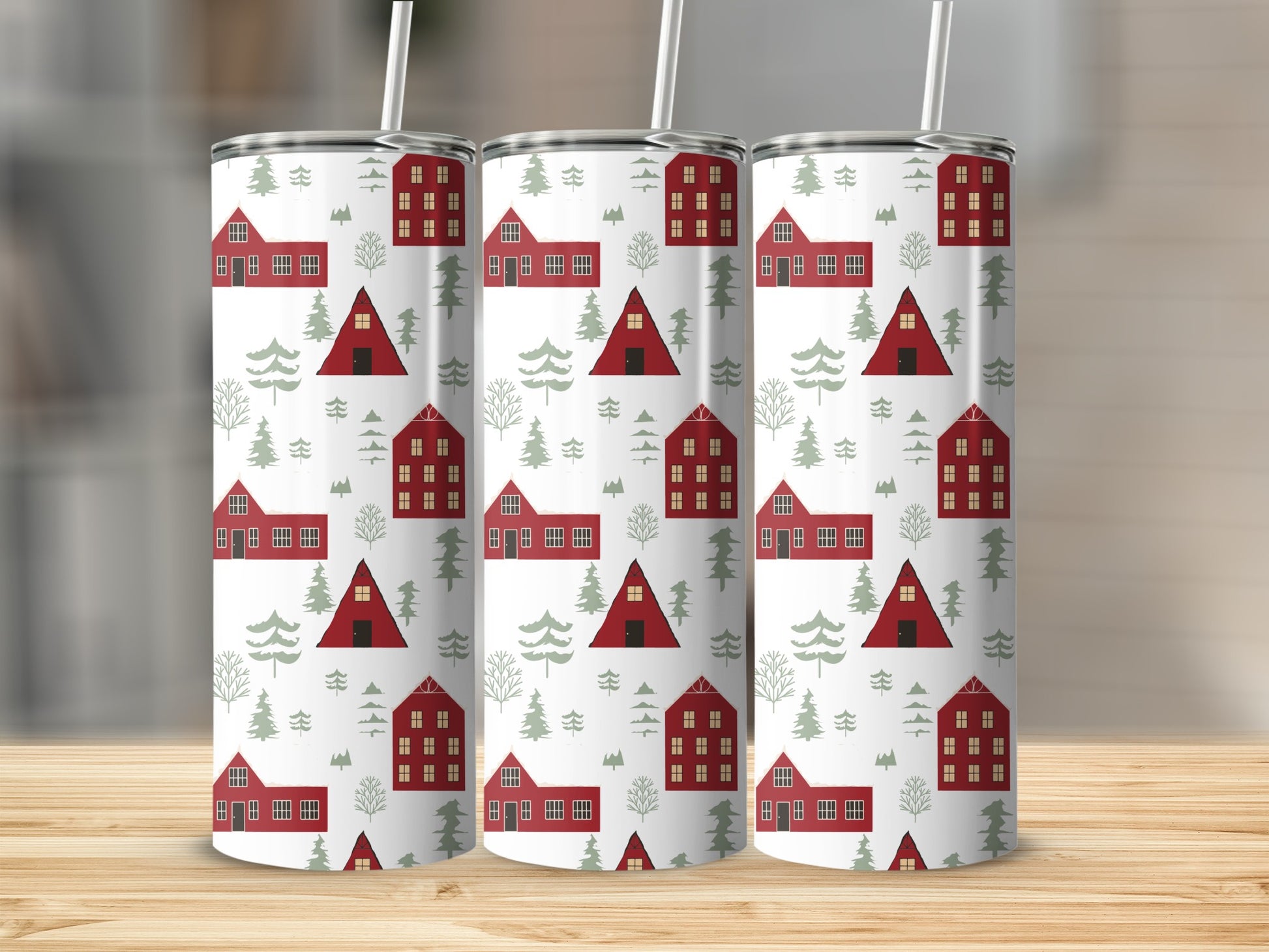 Three tumblers with red houses and green trees pattern.
